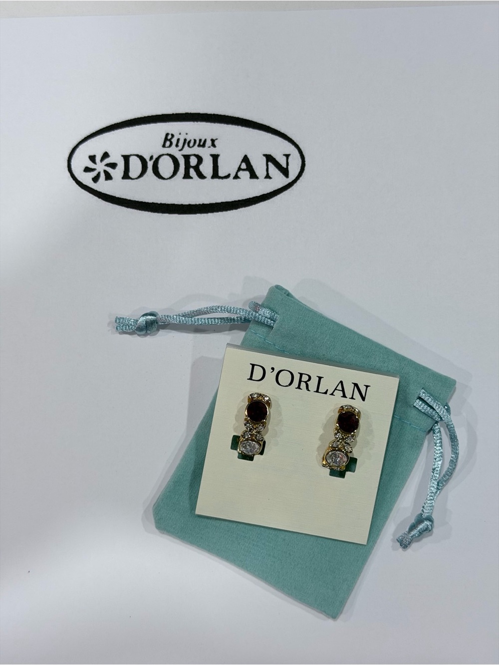 D'Orlan half-hoop clip-on earrings with bezel-set crystals and Swarovski crystal